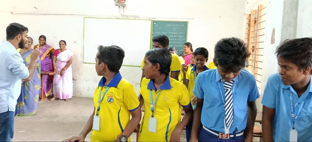 School students taking part in an interactive classroom activity